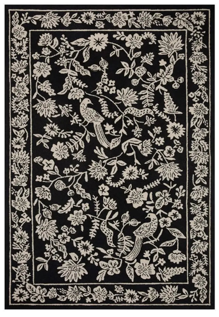 Hand Tufted  wool carpet in Selva Black design, crafted with 100% handmade process using natural fibers, featuring vibrant geometric patterns for modern home decor.