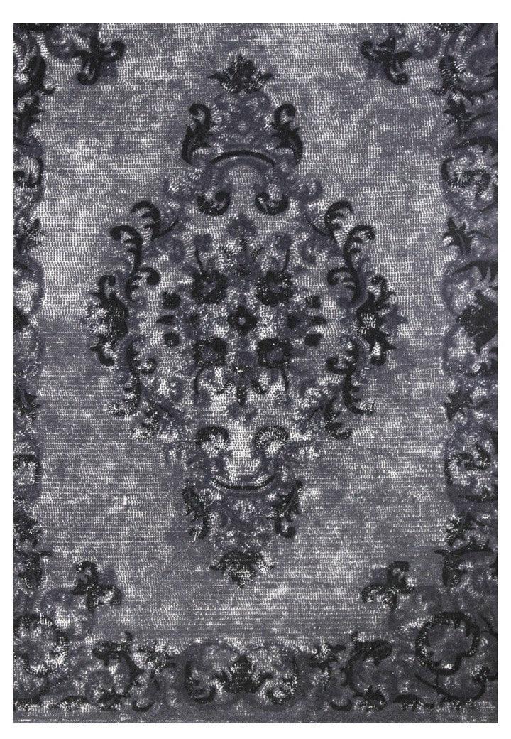 Hand-tufted wool carpet in   Wogre design, crafted with 100% handmade process using natural fibers, featuring vibrant geometric patterns for modern home decor.