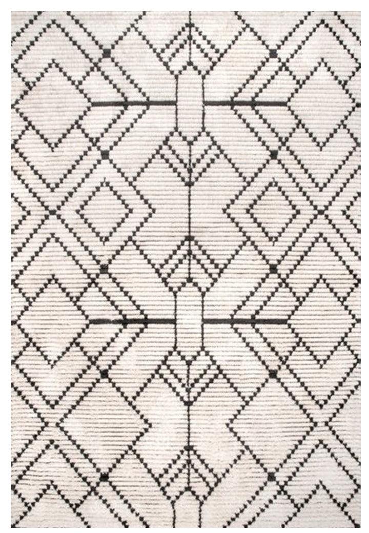 Hand-tufted wool carpet in    Texturizado design, crafted with 100% handmade process using natural fibers, featuring vibrant geometric patterns for modern home decor.